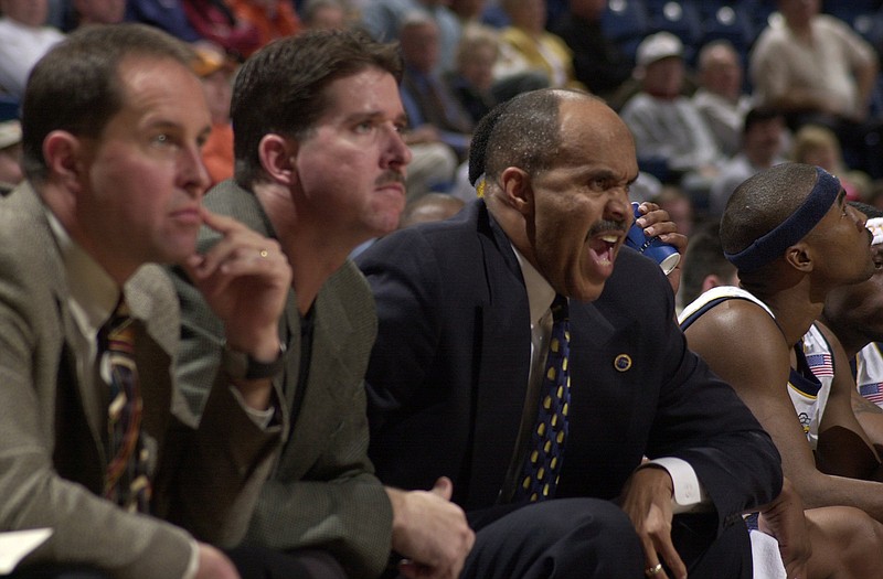 Staff file photo / Henry Dickerson shouts out instructions as he coaches the UTC men's basketball team during a home game. Dickerson, a Mocs assistant for eight seasons under Mack McCarthy and the team's head coach for five years, died Thursday night at age 71.
