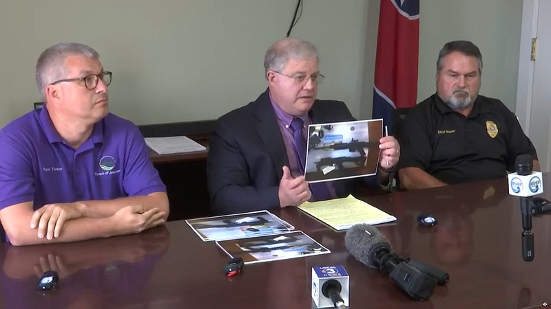Screenshot of livestreamed news conference / From left, Jasper Mayor Jason Turner, City Attorney Mark Raines and Police Chief Billy Mason discuss footage from an Aug. 5 traffic stop at a news conference Thursday.