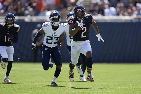 Chicago Bears' Khalil Herbert heads to the end zone for a touchdown in an  NFL preseason football game against the Tennessee Titans Saturday, August  12, 2023, in Chicago. (AP Photo/Charles Rex Arbogast