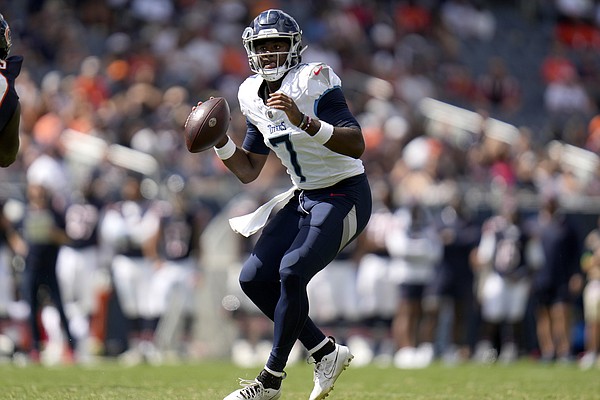 Tennessee Titans running back Hassan Haskins (25) runs for yardage