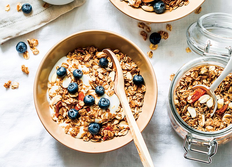 Getty Images / Homemade pumpkin granola with Greek yogurt and blueberries