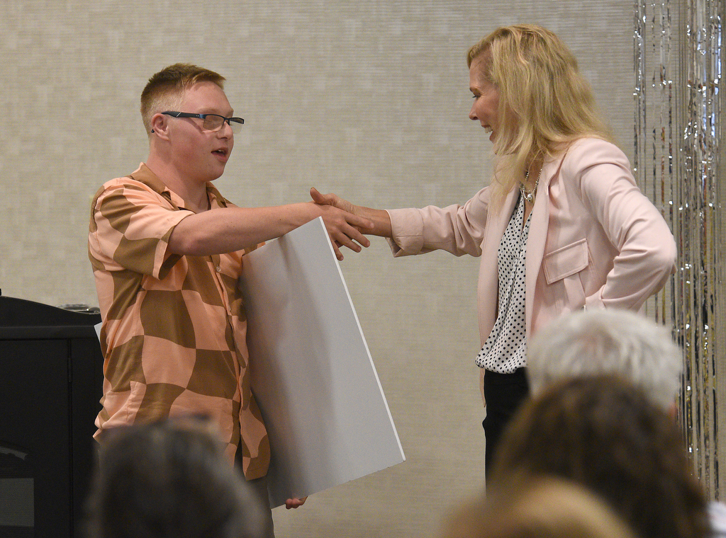 Staff Photo by Matt Hamilton / School President Rebecca Ashford, right, shakes hands with student Luka Hyde at Chattanooga State Community College on Monday.