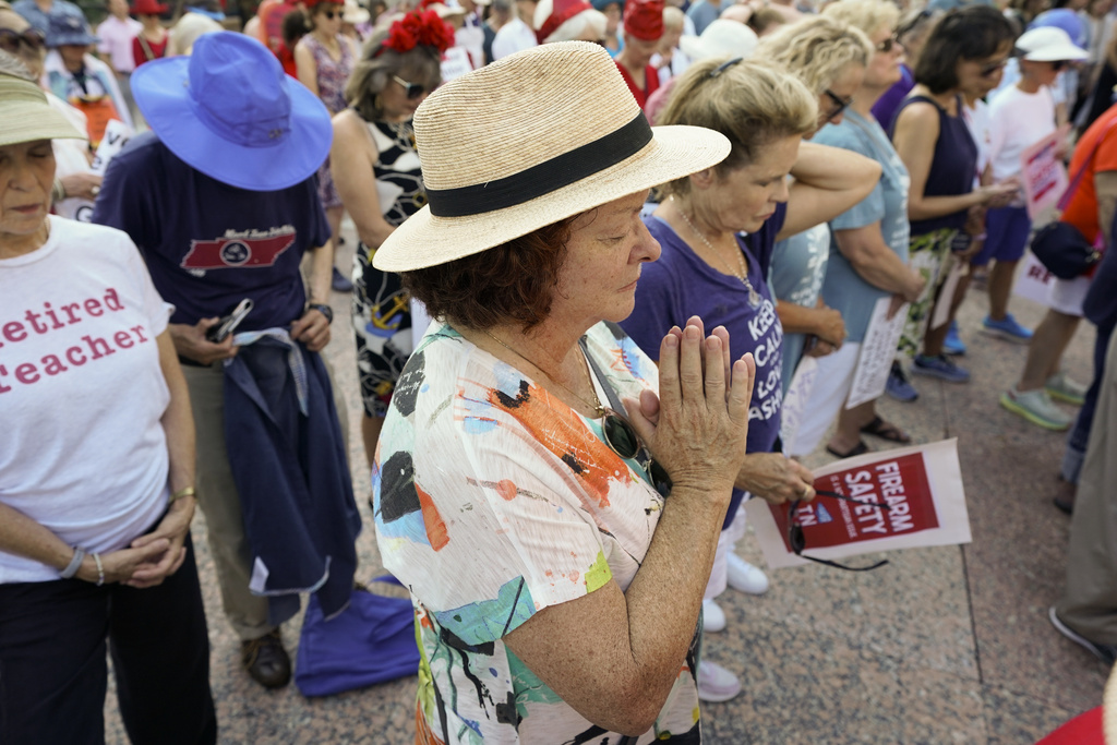 Eve Hutcherson prays before a special session of the state legislature on public safety Monday, Aug. 21, 2023, in Nashville, Tenn. (AP Photo/George Walker IV)