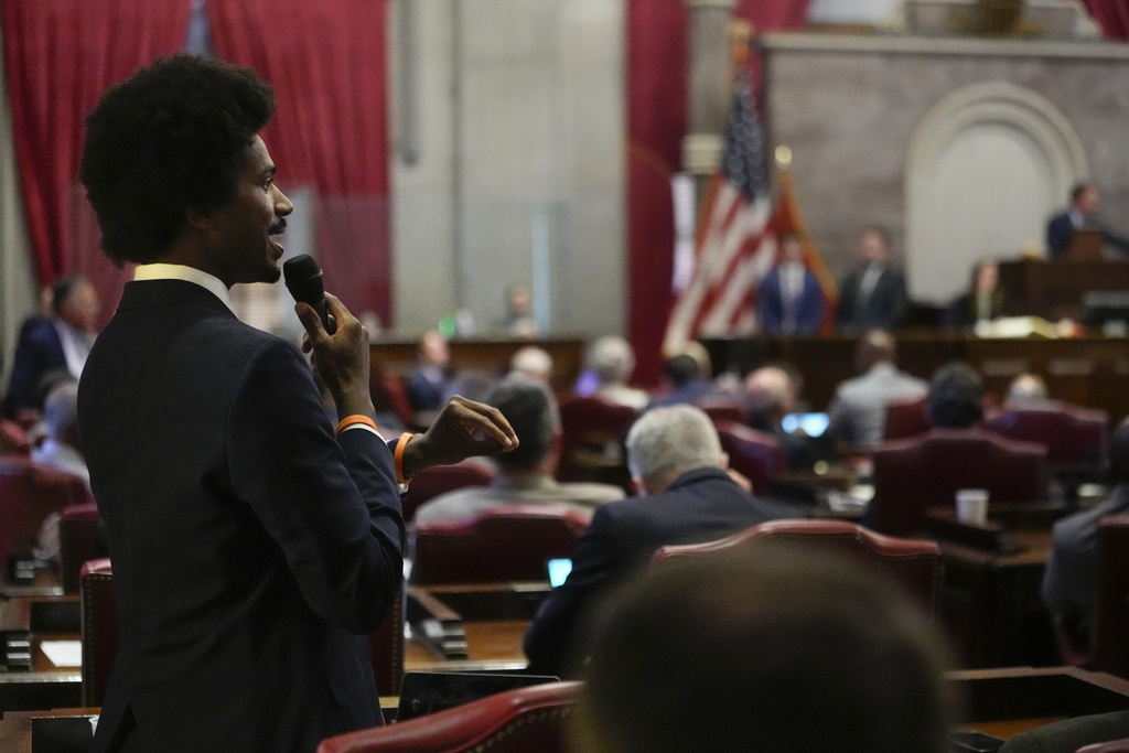 Rep. Justin J. Pearson, D-Memphis, speaks from the House floor during a special session of the state legislature, Monday, Aug. 21, 2023, in Nashville, Tenn. (AP Photo/George Walker IV)