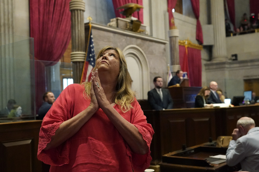Rep. Gloria Johnson, D-Knoxville, looks up to the gallery from the House floor during a special session of the state legislature Monday, Aug. 21, 2023, in Nashville, Tenn. Deeply divided Tennessee lawmakers returned to the state Capitol Monday, kicking off a special session that many hoped would address the state's relaxed gun laws but instead quickly devolved into bitter fighting over procedural rules and limits on public access into the building.(AP Photo/George Walker IV)