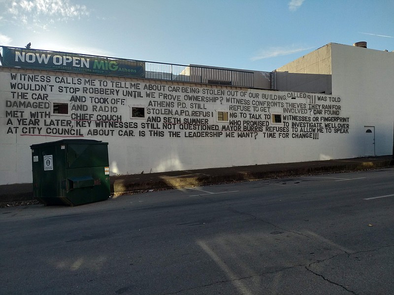 Contributed Photo / This sign Glenn Whiting, of Athens, Tenn., painted on the side of a building on the courthouse square led to a federal free speech lawsuit that was decided against Whiting in a 2022 jury trial. That verdict was upheld Aug. 18, 2023, in a U.S. Appeals Court ruling.