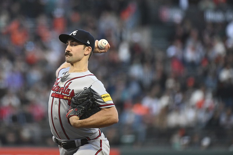 Spencer Strider of the Atlanta Braves delivers a pitch against the