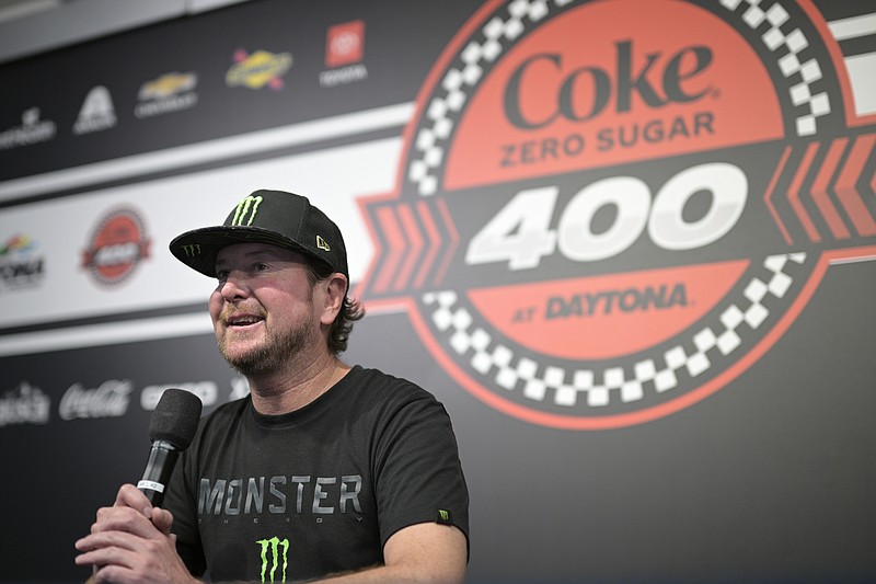 AP photo by Phelan M. Ebenhack / Kurt Busch answers questions from reporters after announcing his retirement from the NASCAR Cup Series before Saturday's regular-season finale at Daytona International Speedway.