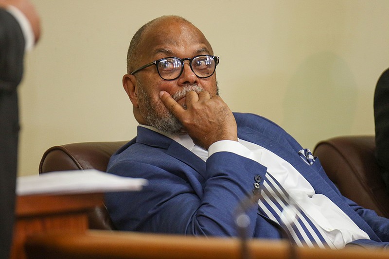 Staff photo by Olivia Ross / Rheubin Taylor sits and listens on July 5 at the Hamilton County Chancery Court. Chancellor Jeffrey Atherton heard arguments in the lawsuit Hamilton County Attorney Rheubin Taylor filed against Mayor Weston Wamp.