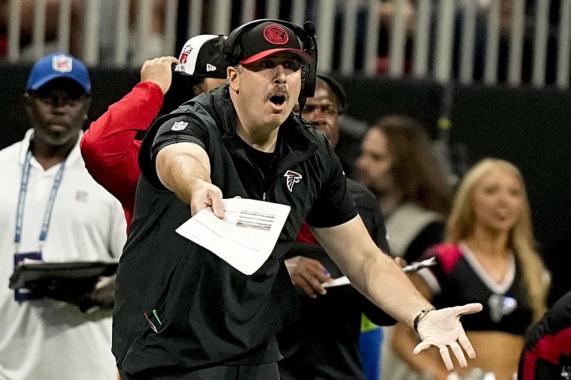 Falcons coach Smith brushes off dismal passing stats following opening win  over Panthers