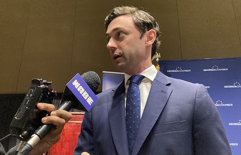 U.S. Sen Jon Ossoff, D-Ga., speaks to reporters Aug. 8 before a Georgia Chamber of Commerce luncheon in Athens, Ga. Ossoff is pushing a bill that would require members of Congress to put their stocks in a blind trust. (AP Photo/Jeff Amy)