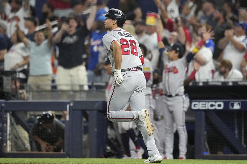 AP photo by Lynne Sladky / The Atlanta Braves' Matt Olson runs the bases after hitting a solo homer in the sixth inning of Saturday's game against the host Miami Marlins. Olson's 52nd home run of the year gave him sole possession of the franchise's single-season record.