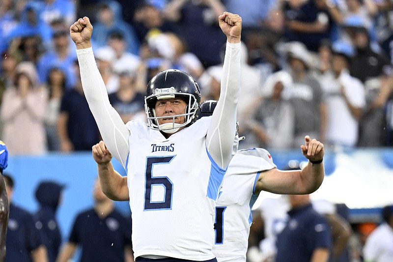 AP photo by John Amis / Tennessee Titans kicker Nick Folk celebrates after making a 41-yard field goal to beat the Los Angeles Chargers 27-24 in overtime Sunday in Nashville. The Titans won for the first time since last November.