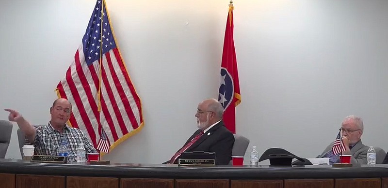 Screenshot / Athens Vice Mayor Larry Eaton, left, talks Tuesday about being threatened at City Hall before he was elected in 2022 in this screenshot of the livestreamed meeting. Also pictured are Mayor Steve Sherlin, center, and council member Dick Pelley.