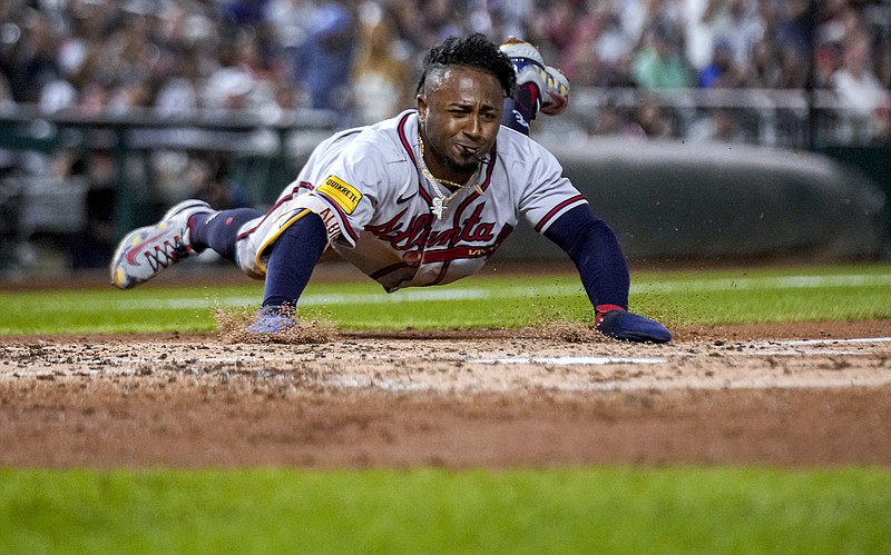 OZZIE ALBIES COMES THROUGH WITH A THREE-RUN HOMER TO GIVE THE BRAVES T