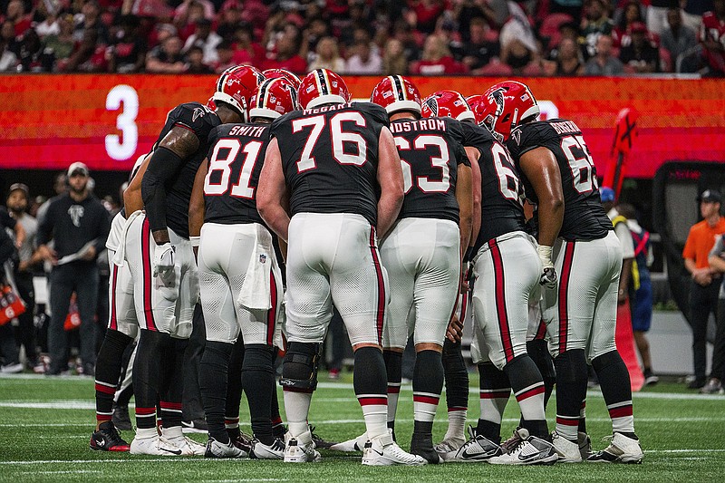 AP photo by Danny Karnik / The Atlanta Falcons huddle during the first half of last Sunday's 25-24 home win against the Green Bay Packers.