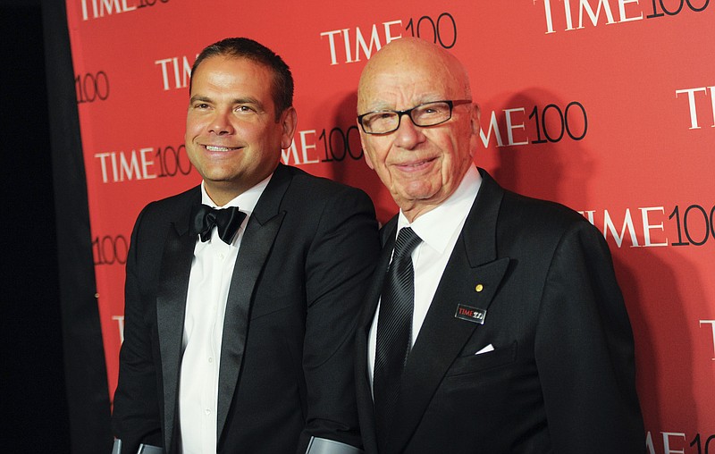 File photo/Evan Agostini/Invision/The Associated Press / Lachlan Murdoch, left, and Rupert Murdoch attend the TIME 100 Gala in New York on April 21, 2015. Media magnate Rupert Murdoch is stepping down as chairman of News Corp. and Fox Corp., the companies that he built into forces over the last 50 years.    Lachlan Murdoch will control both companies.