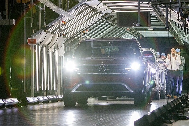 Staff file photo / Two Atlas Cross Sports are driven of the assembly line at the Volkswagen Chattanooga production plant in 2019.