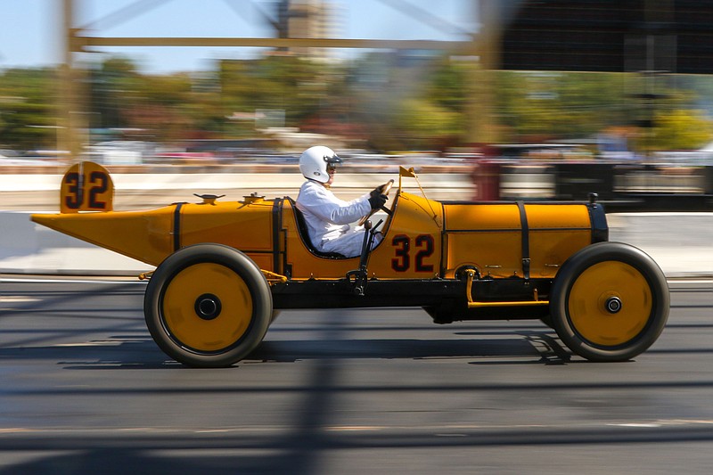 Staff file photo by Olivia Ross  / Kindall Jolly races around the track in a feature race for brass and tin-top vehicles from 1909-1918 at the 2022 Chattanooga Motorcar Festival.