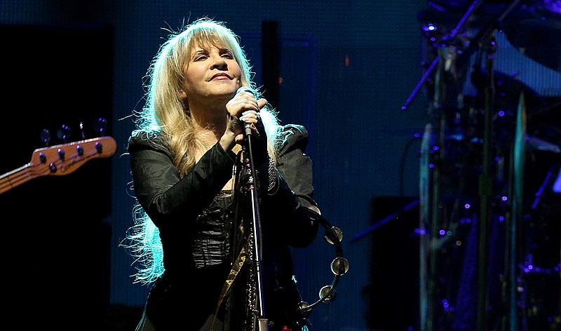 Photo by Rich Fury / The Associated Press / Stevie Nicks of Fleetwood Mac performs at a gala event at Dodgers Stadium in Los Angeles.