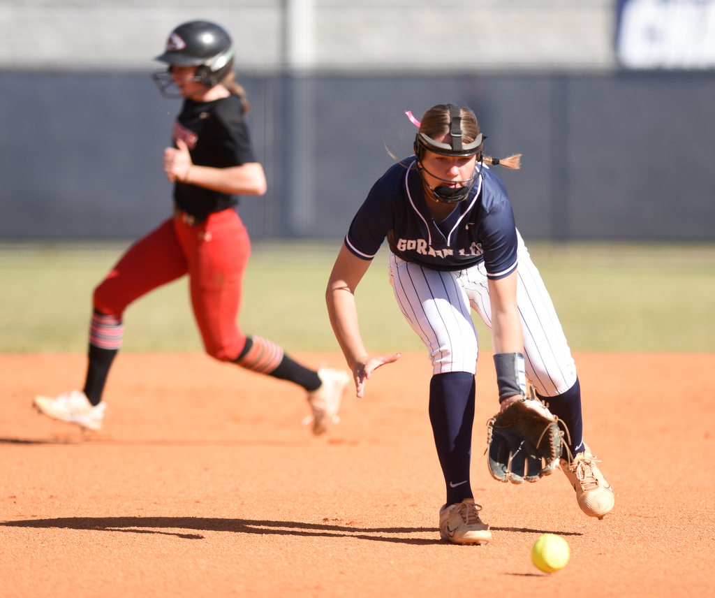 Staff photo by Matt Hamilton/ A Stephens County runner moves to third as Gordon Lee (23) Abby Logan fields a grounder at Gordon Lee on Tuesday, October 17, 2023. Gordon Lee went on to win the game, 15-0 in three innings by the mercy rule.