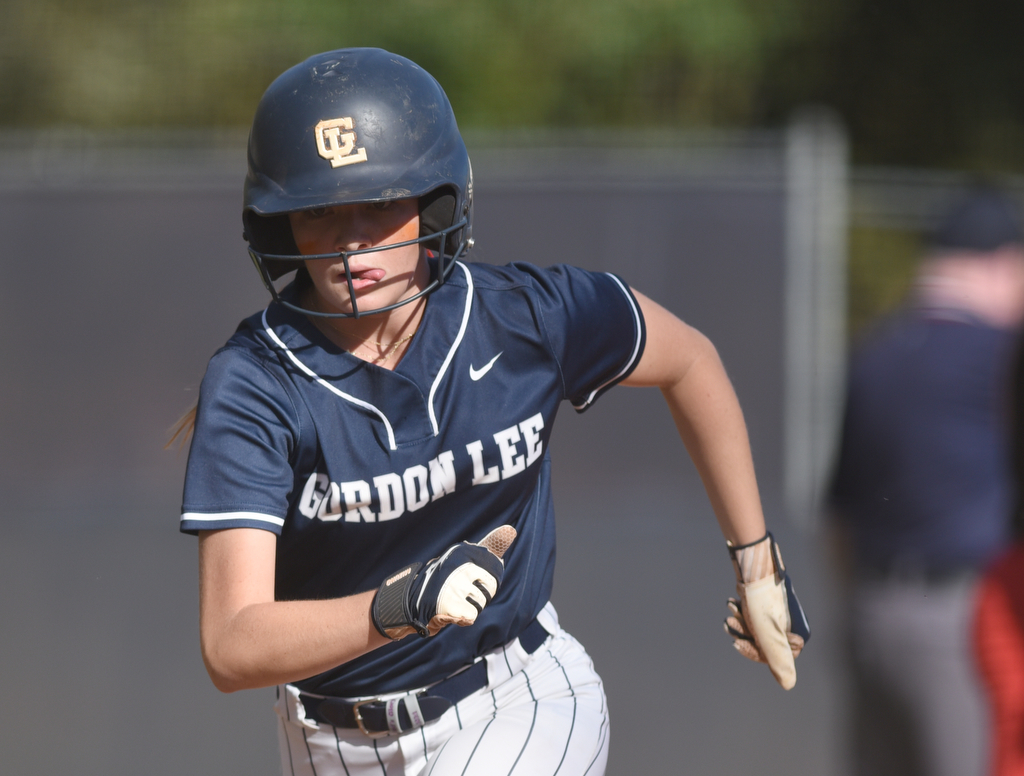 Staff photo by Matt Hamilton/ Gordon Lee (7) Kaley Russell runs for home against Stephens County at Gordon Lee on Tuesday, October 17, 2023. Gordon Lee went on to win the game, 15-0 in three innings by the mercy rule.