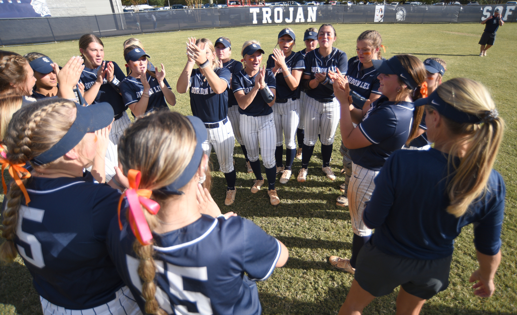 Staff photo by Matt Hamilton/ Gordon Lee players celebrate their win over Stephens County after coach Dana Mull talked to them at Gordon Lee on Tuesday, October 17, 2023. Gordon Lee went on to win the game, 15-0 in three innings by the mercy rule.