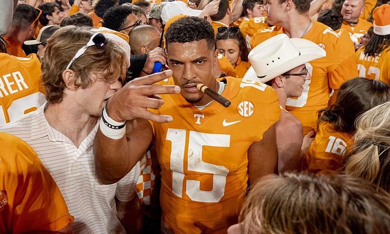 Tennessee Athletics photo by Andrew Ferguson / Tennessee receiver Bru McCoy enjoys a victory cigar amid Volunteers fans following last October's 52-49 outlasting of Alabama inside Neyland Stadium.