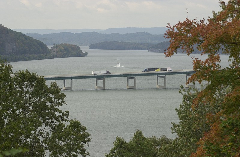 Staff Photo / Interstate 24 carries traffic across Nickajack Lake while a boat moves downstream on the Tennessee River in this 2005 photo.