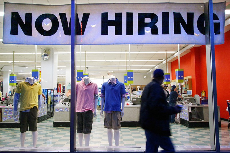 File photo / A Kmart department store sign reads "Now Hiring." Despite the shutdown of six area plants so far in 2023, Chattanooga's jobless rate declined to 3.3% in September and remains below the state and national average unemployment rates.
