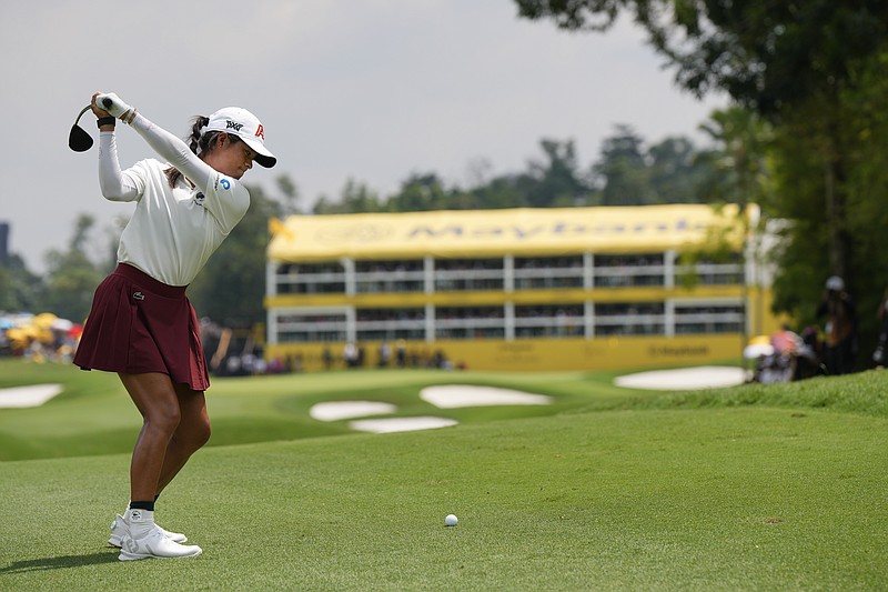 AP photo by Vincent Thian / Celine Boutier hits on the 18th fairway during the final round of the LPGA Tour's Maybank Championship on Sunday in Kuala Lumpur, Malaysia.