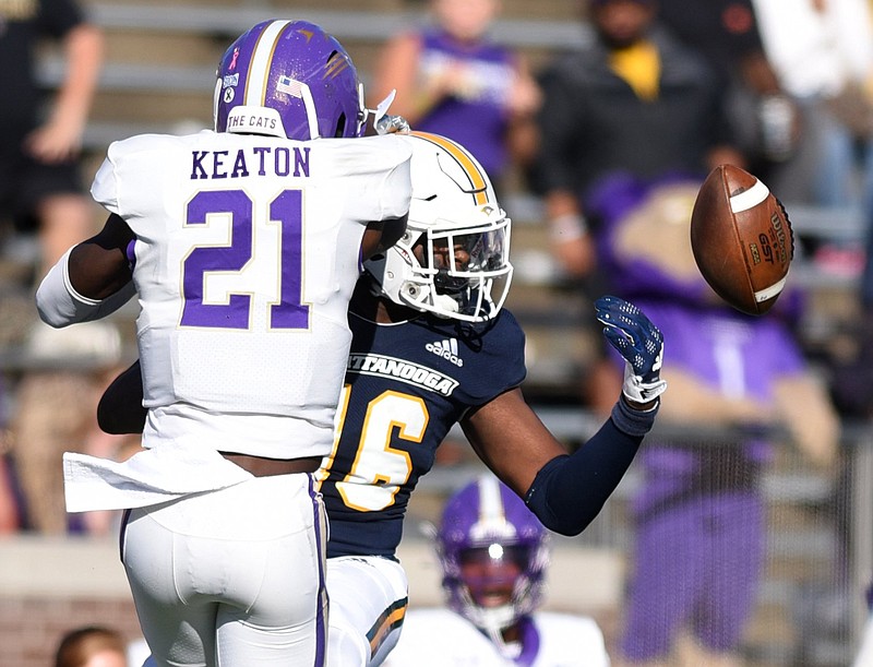 Staff photo by Matt Hamilton / UTC tight end Camden Overton is unable to make the catch while covered by Western Carolina's Andreas Keaton during a SoCon game on Oct. 7 at Finley Stadium.