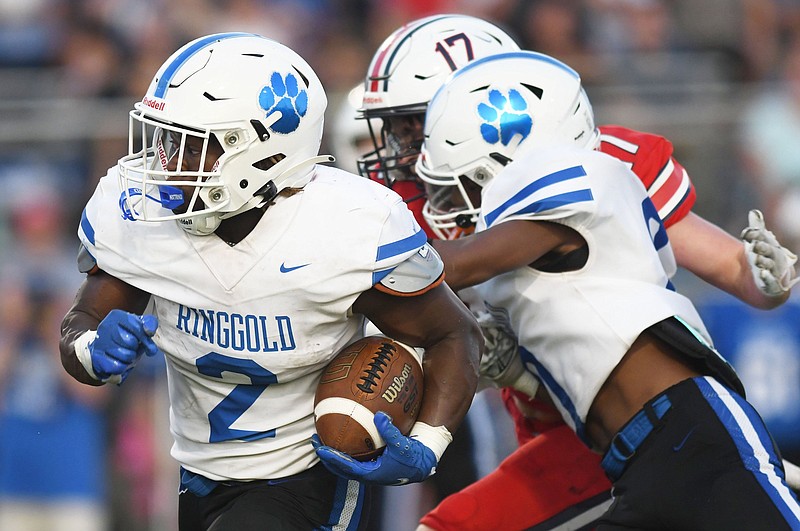 Staff file photo by Robin Rudd / Ringgold's Haddon Fries (2) and Kishaun Taylor, right, combined for more than 230 rushing yards as the Tigers topped Gordon Lee on Friday night to advance to the GHSA Class AAA playoffs.