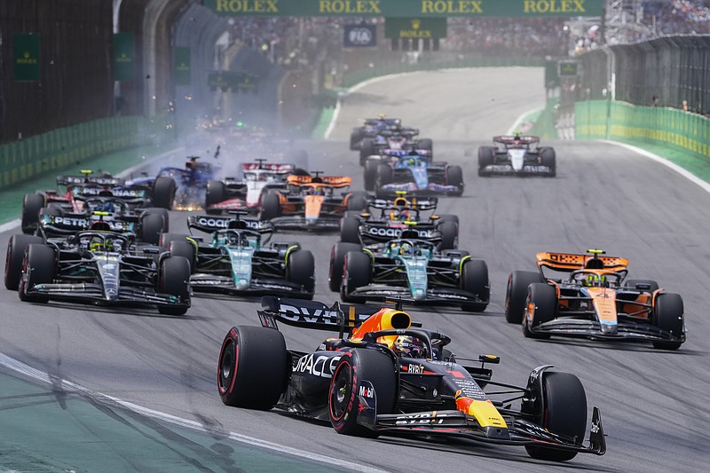 AP photo by Andre Penner / Red Bull driver Max Verstappen, front, leads the pack in Formula One's Brazilian Grand Prix on Sunday in Sao Paulo.