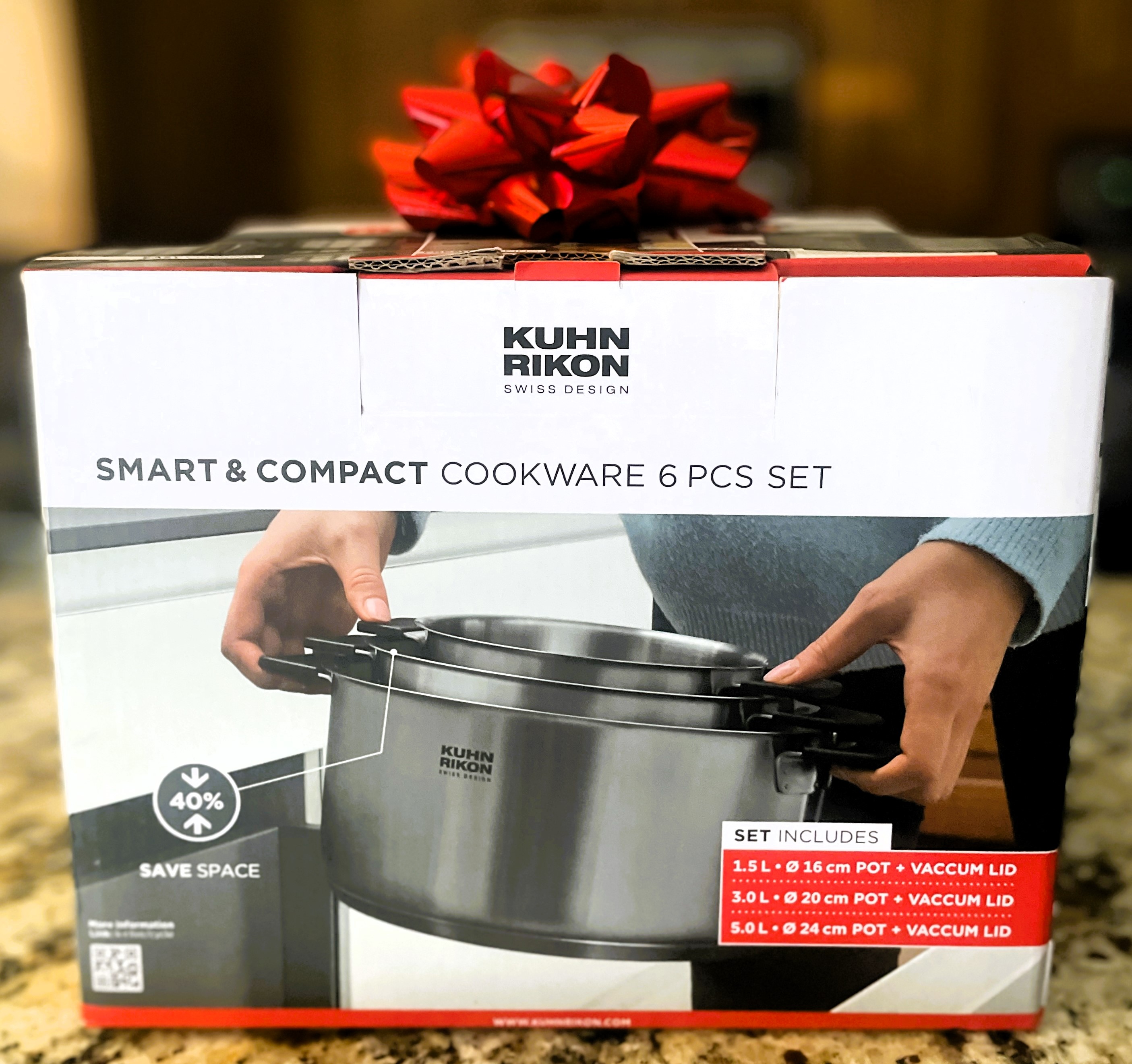 https://wehco.media.clients.ellingtoncms.com/imports/adg/photos/103020796_For-the-cook-on-your-list-who-has-a-problem-with-cabinet-space-Kuhn-Rikon-s-compact-cookware-set-is-the-answer..jpg
