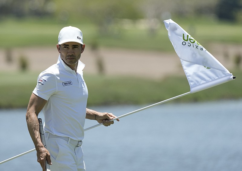 AP file photo by Moises Castillo / Camilo Villegas won the PGA Tour's Butterfield Bermuda Championship on Sunday, his first victory in more than nine years.