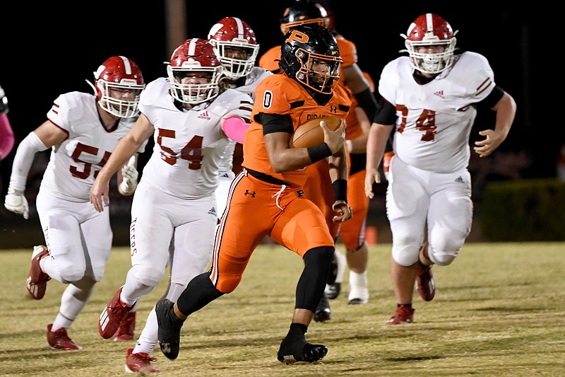 Staff photo by Robin Rudd / South Pittsburg senior quarterback Kamden Wellington breaks free for a touchdown during a home game against Whitwell on Oct. 26. Wellington, already a talented passer as the team's starter in 2022, devoted extra time in the offseason to getting into better shape so he could become more of a threat to run this fall.