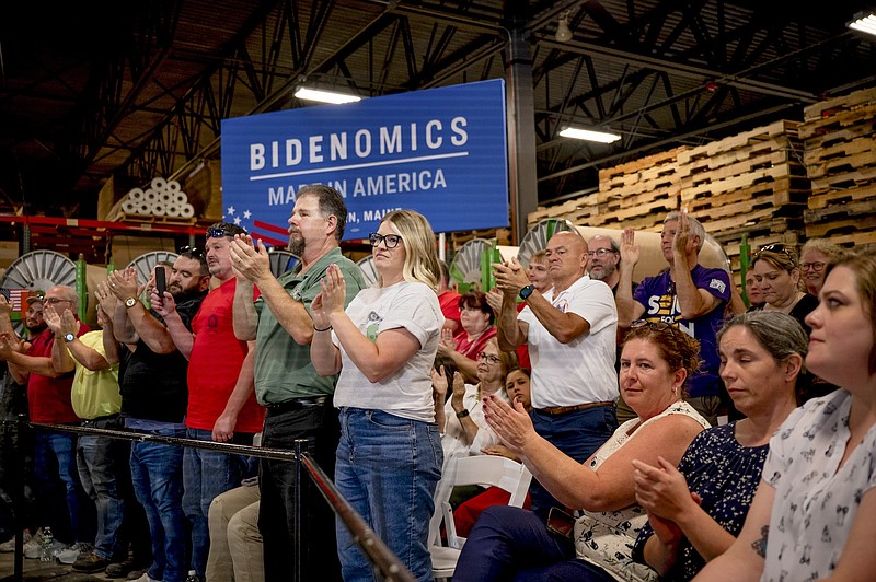 File photo/Desiree Rios/The New York Times / Attendees listen to President Joe Biden at an event touting his administrations economic policies and progress at Auburn Manufacturing Inc., Auburn, Maine, on July 28, 2023.