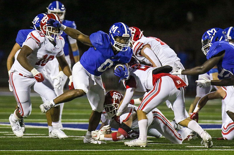 Staff photo by Olivia Ross / McCallies Javon McMahan (0) runs the ball. McCallie took on Baylor at home on Friday, September 29, 2023.
