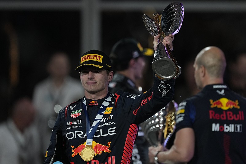 AP photo by Kamran Jebreili / Red Bull driver Max Verstappen celebrates after winning the Abu Dhabi GP on Sunday at the Yas Marina Circuit. It was the final race on Formula One's 2023 schedule.