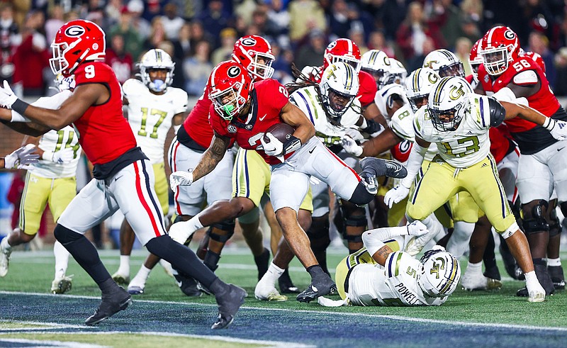 Georgia photo by Tony Walsh / Georgia senior running back Kendall Milton rushed for 156 yards and two touchdowns last Saturday night in the 31-23 victory at Georgia Tech, which extended the winning streak of the Bulldogs to 29 games.