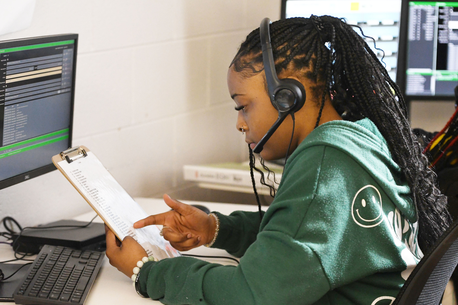 Staff Photo by Robin Rudd / Jamariya Waddle checks the coding for an incident during a simulation on Thursday. Brainerd High has launched a new 911 dispatch pathway this fall as part of the Future Ready Institute of Law, First Responders and Forensic Science.