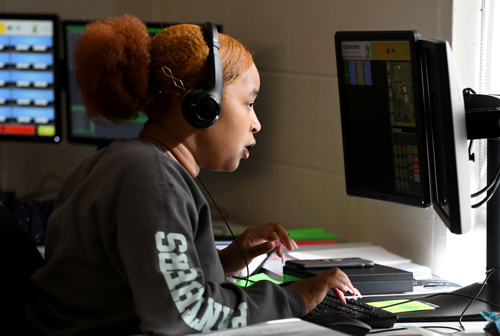 Staff Photo by Robin Rudd / Raquel Butts advises a citizen during a simulation on Thursday. Brainerd High has launched a new 911 dispatch pathway this fall as part of the Future Ready Institute of Law, First Responders and Forensic Science.