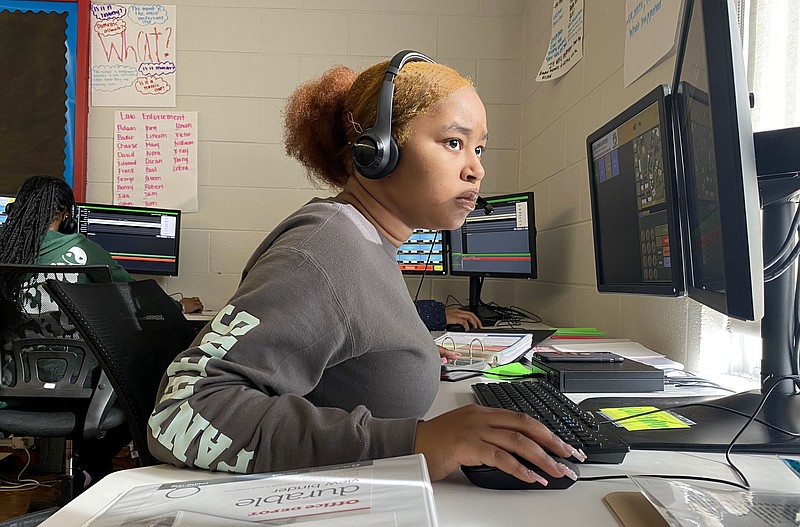 Staff Photo by Robin Rudd / Raquel Butts follows the information on her screens on Thursday. Brainerd High has launched a new 911 dispatch pathway this fall as part of the Future Ready Institute of Law, First Responders and Forensic Science.