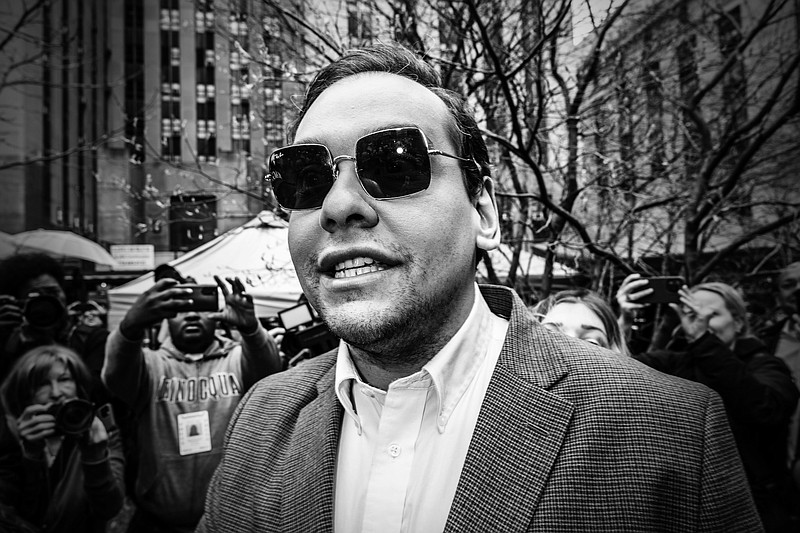 Photo/Mark Peterson/The New York Times / Rep. George Santos, R-New York, is surrounded by media outside the courthouse in New York where Donald Trump was on trial on April 4, 2023. A clout-chasing con man obsessed with celebrity, driven into politics not by ideology but by vanity and the promise of proximity to rich marks, Santos is a pure product of Trumps Republican Party, NYT columnist Michelle Goldberg writes.
