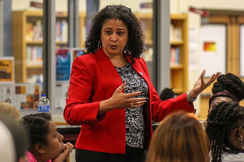 Staff photo by Olivia Ross / Deputy Superintendent Dr. Sonia Stewart speaks at a community feedback meeting about the school facilities plan at The Howard School on Oct. 26.