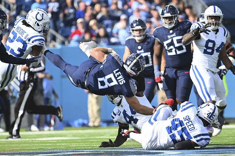 AP photo by John Amis / Tennessee Titans quarterback Will Levis dives for a first down against the Indianapolis Colts' E.J. Speed during Sunday's AFC South Division game in Nashville.