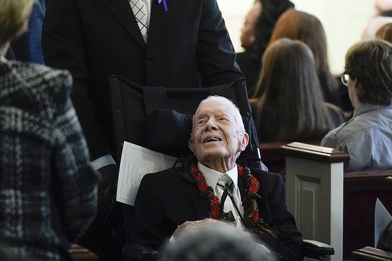 Former President Jimmy Carter greets people as he leaves after the funeral service for his wife, former first lady Rosalynn Carter, at Maranatha Baptist Church on Nov. 29 in Plains, Ga. The former first lady died Nov. 19. She was 96. (AP Photo/Alex Brandon, Pool)