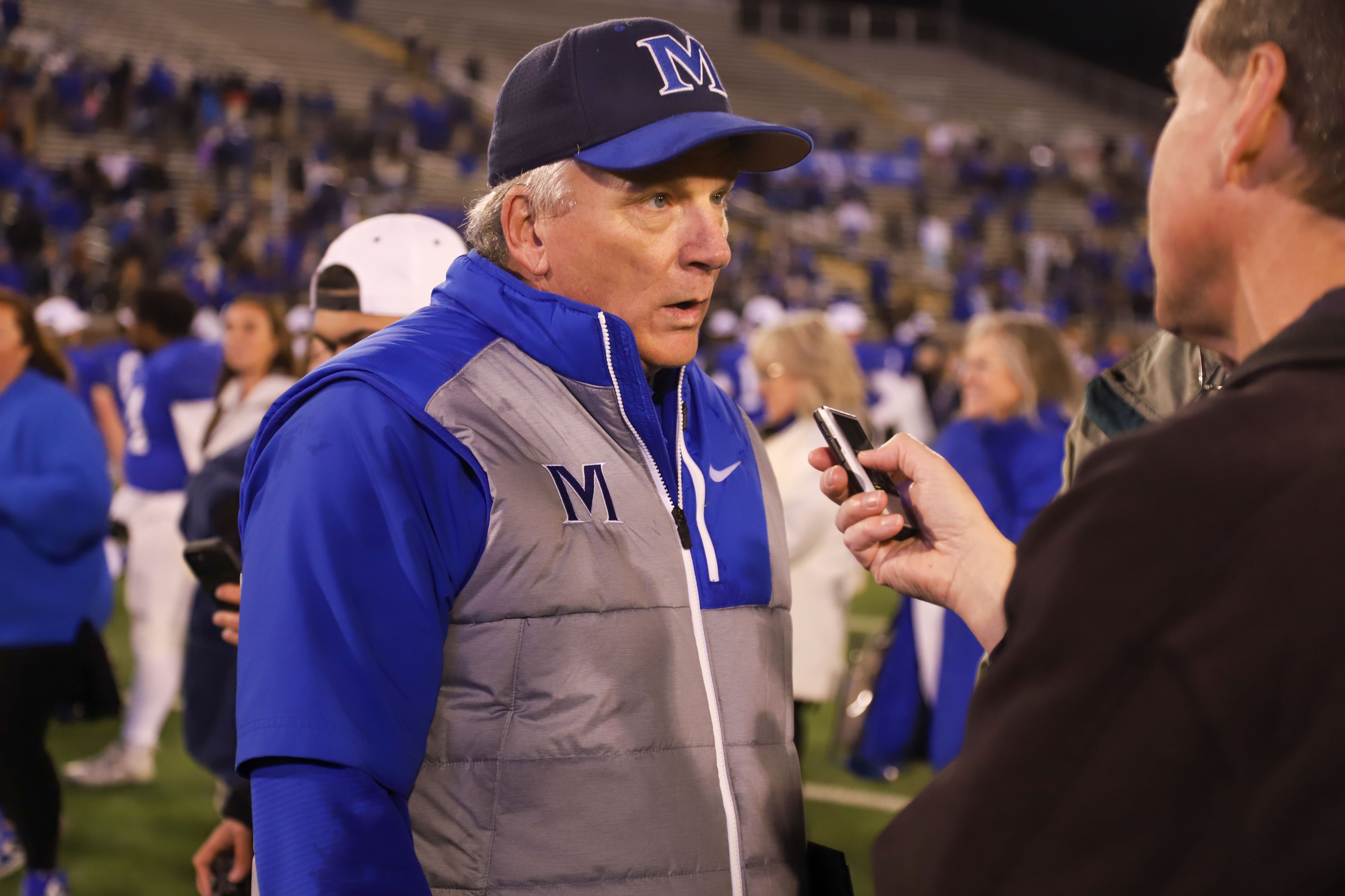 Staff photo by Olivia Ross / McCallies head coach Ralph Potter talks during an interview after their win against Baylor. Baylor took on McCallie on Thursday, November 30, 2023 in the BlueCross Bowl Division II-AAA state championship game at Finley Stadium.