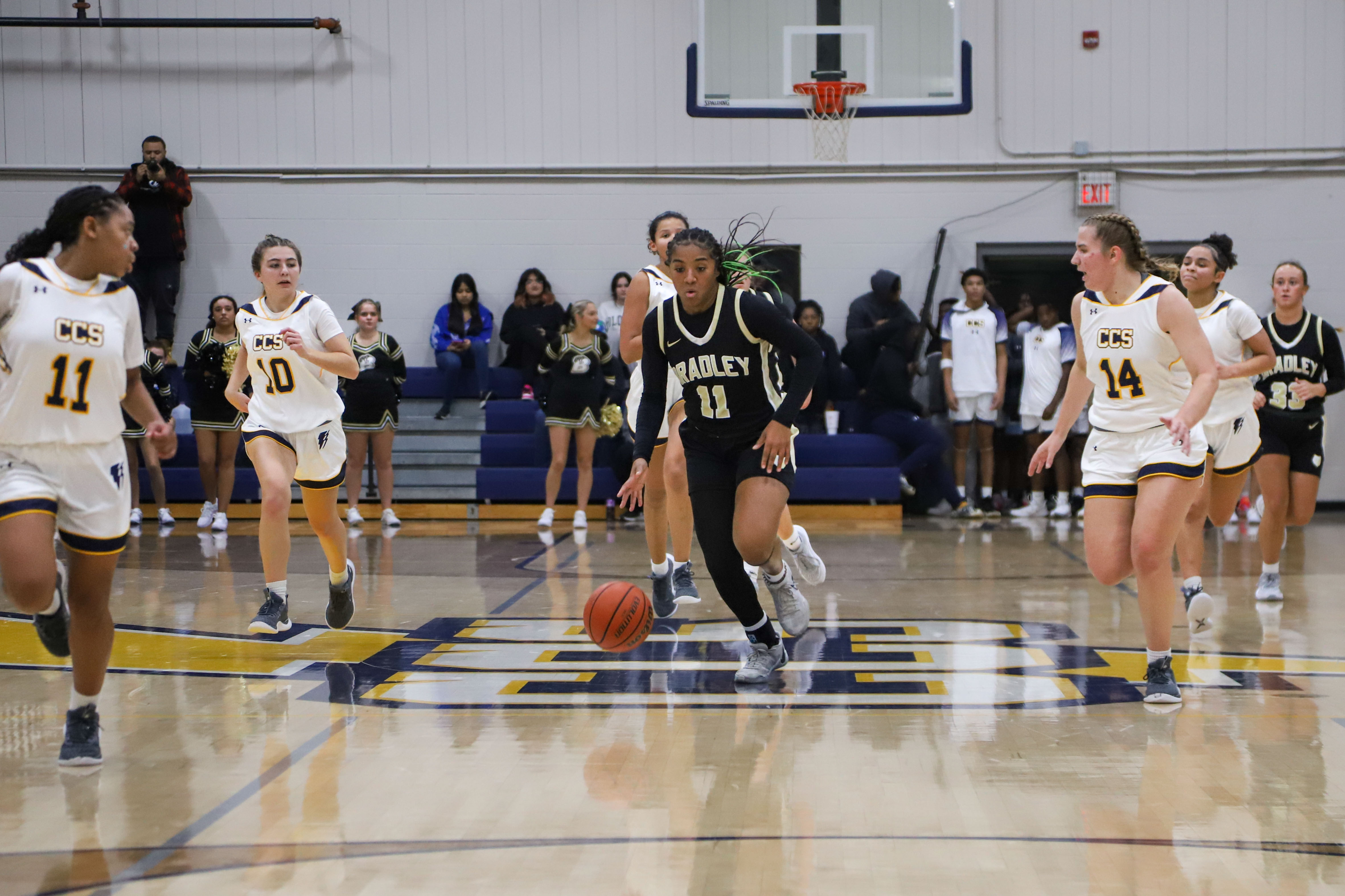 Staff photo by Olivia Ross / Bradley's Harmonie Ware (11) dribbles the ball up the court. Chattanooga Christian took on Bradley Central at home on Tuesday, December 5, 2023.
